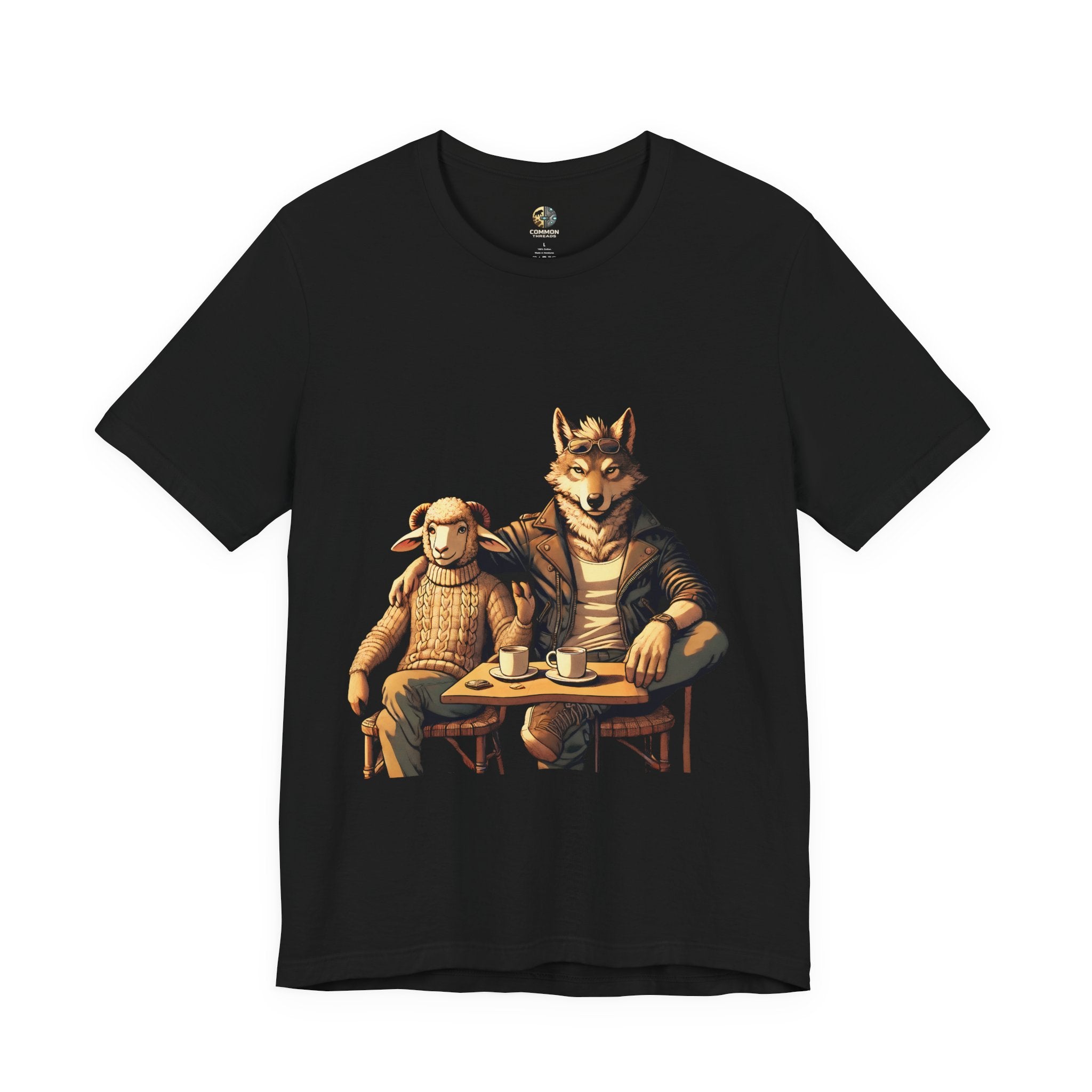 Black T-shirt featuring an anthropomorphic wolf and lamb seated at a café table with coffee cups, illustrated in warm, painterly tones