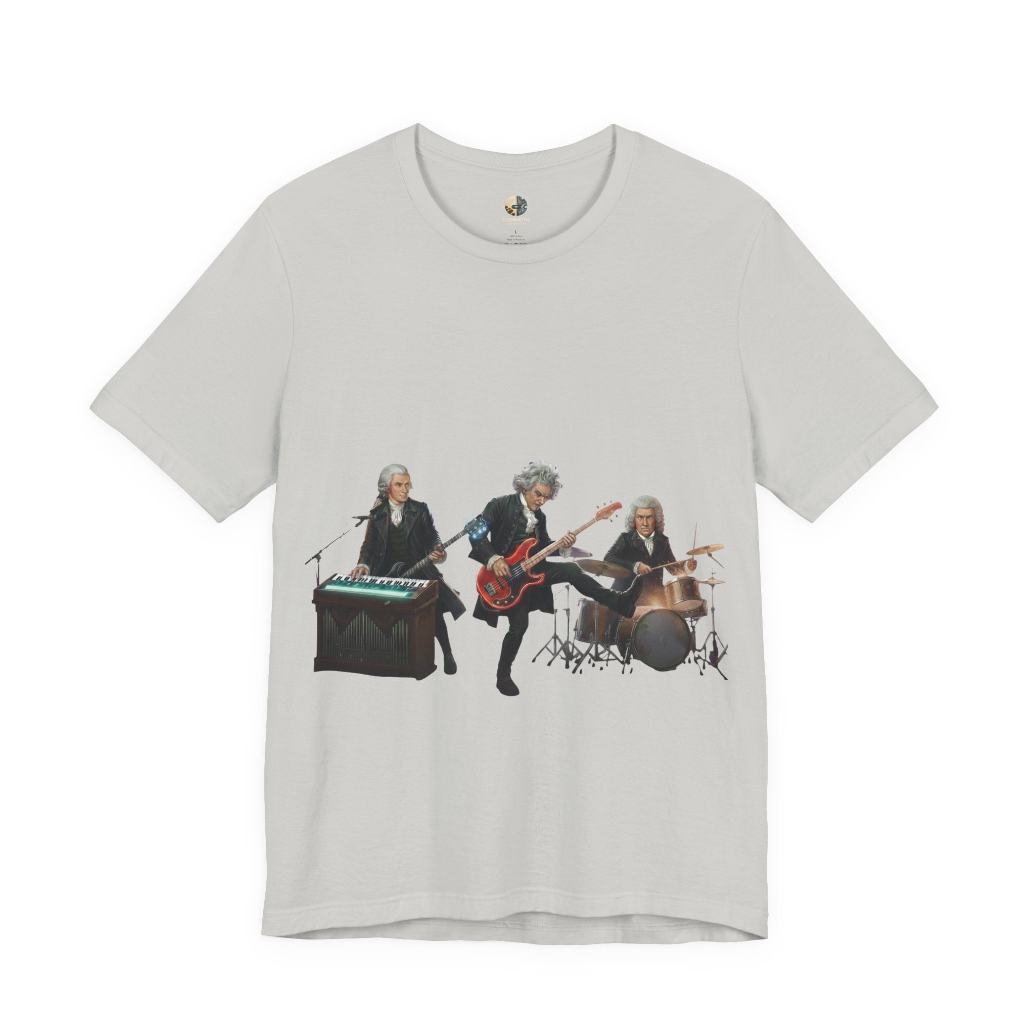 Silver t-shirt featuring Mozart on bass and keyboard, Beethoven on electric guitar, and Bach on drums in a rock band scene