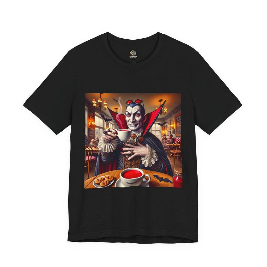 Black T-shirt featuring a classic vampire dressed like Count Dracula sitting in a café, wearing red sunglasses and drinking from a teacup filled with red liquid