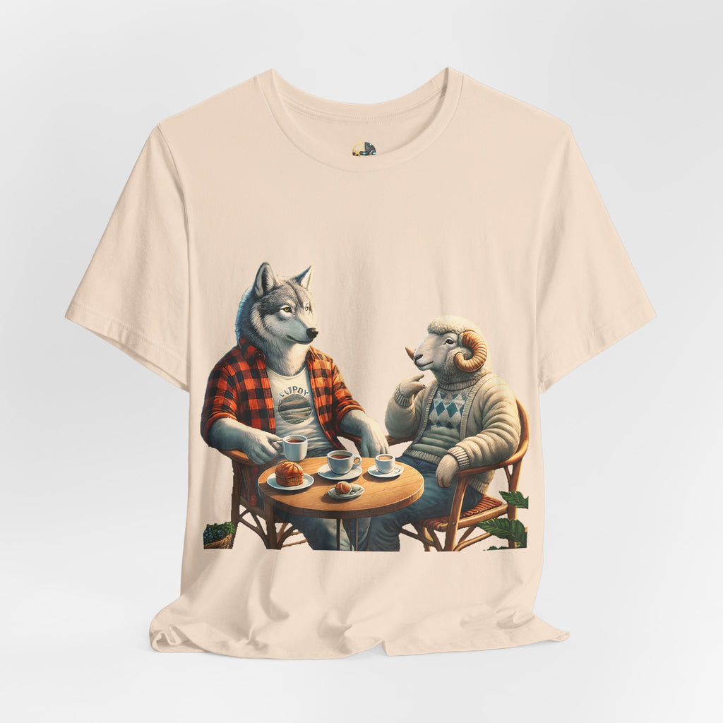 Soft creme T-shirt featuring an anthropomorphic wolf in a flannel shirt and a ram in a patterned sweater sitting at a café table with coffee