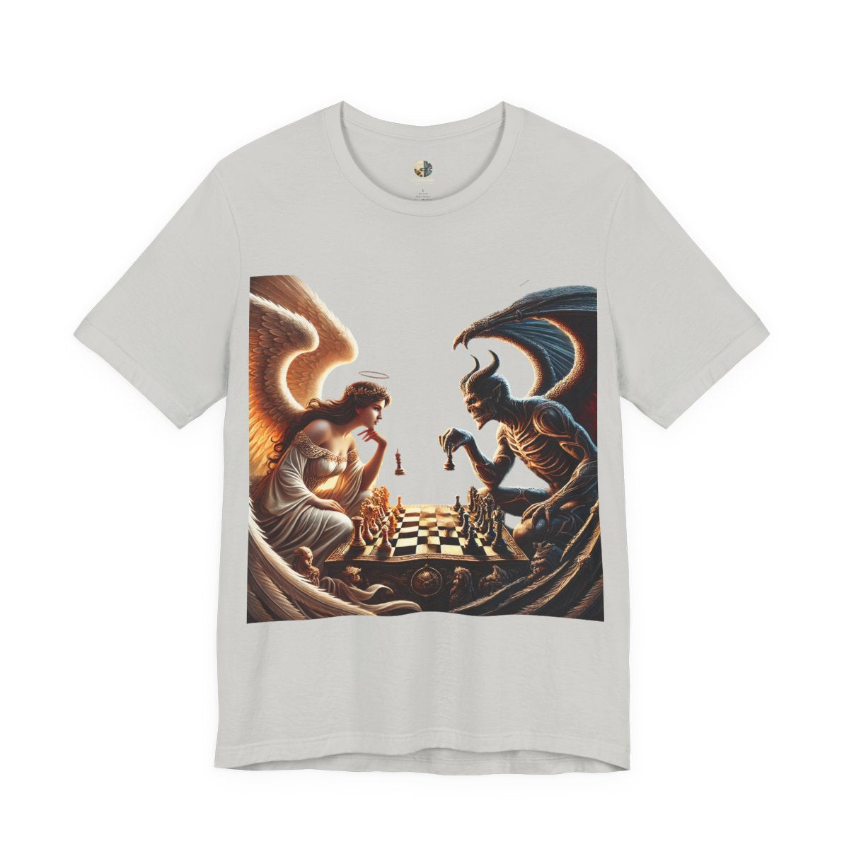 Silver T-shirt featuring a graphic of an angel and a demon playing chess, with a golden king piece levitating